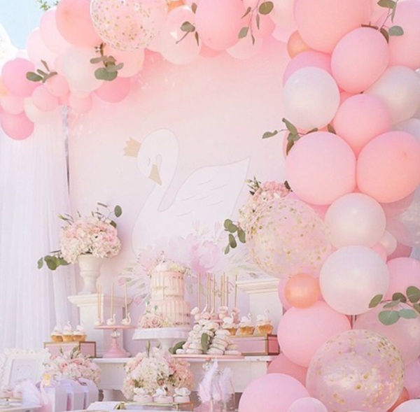 beautiful gold and pink swan bridal shower setup