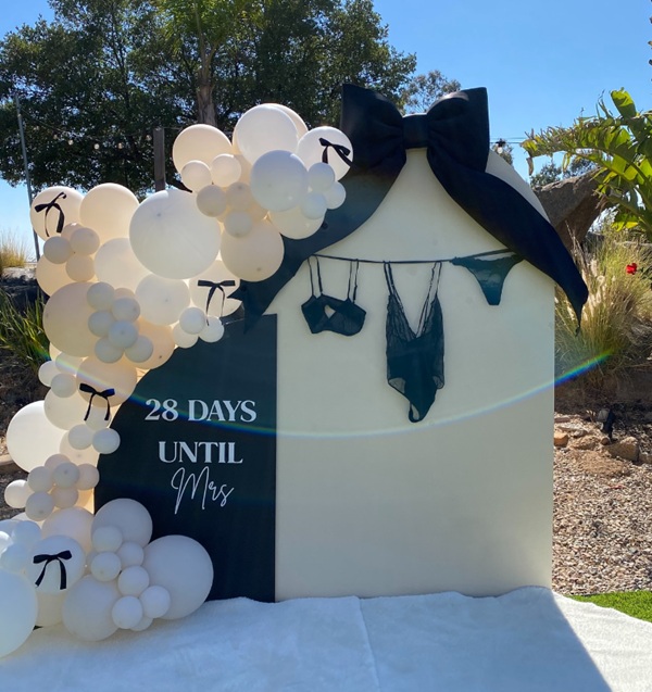 time for champagne and lingerie bridal shower backdrop